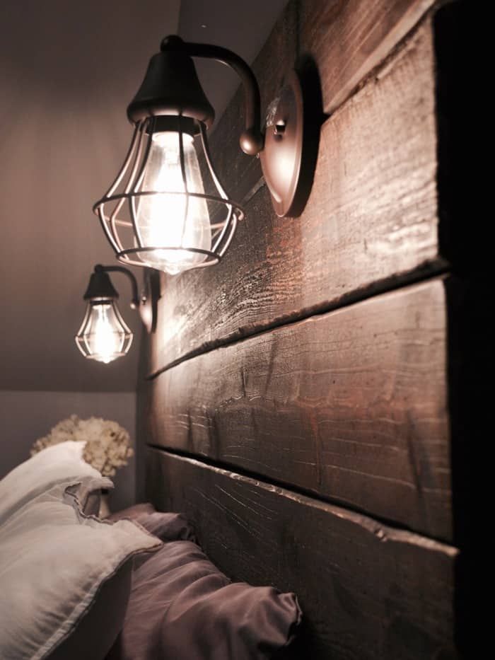 rustic wooden headboard with lights
