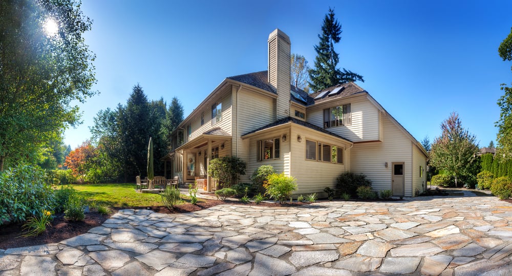 large stone patio backyard