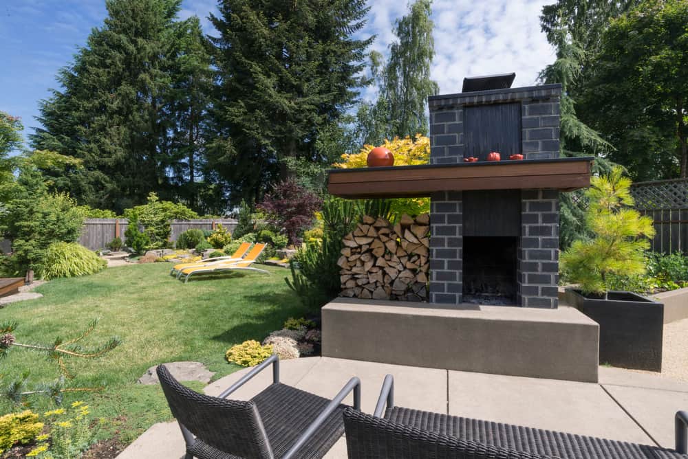 raise black tile mantle fireplace