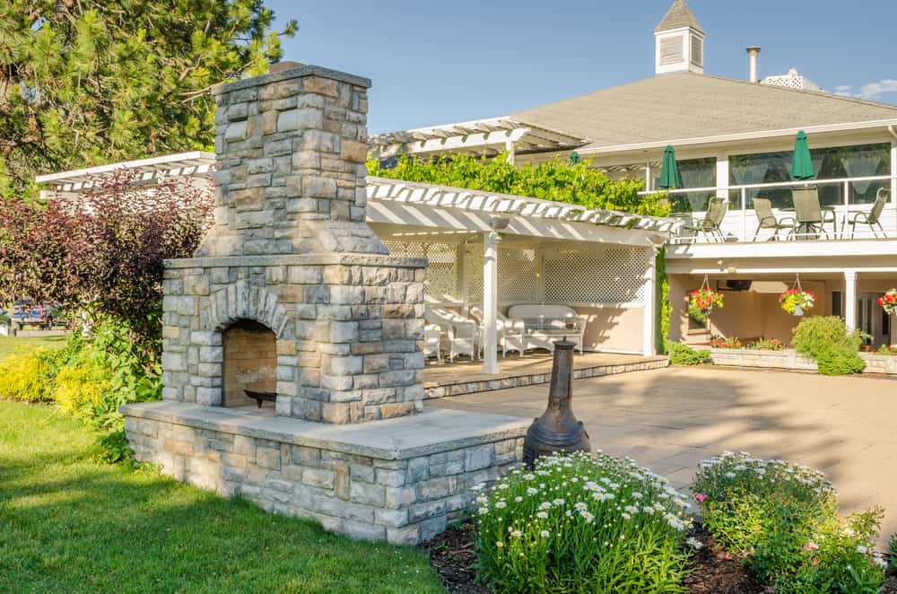 double sided grey brick fireplace