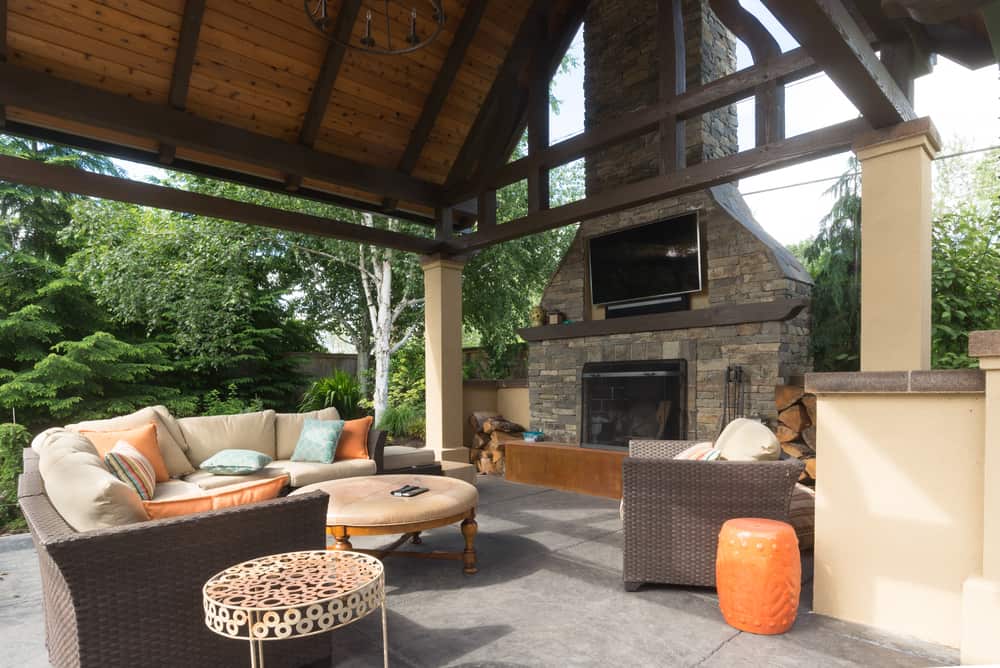 brick iron and wood fireplace