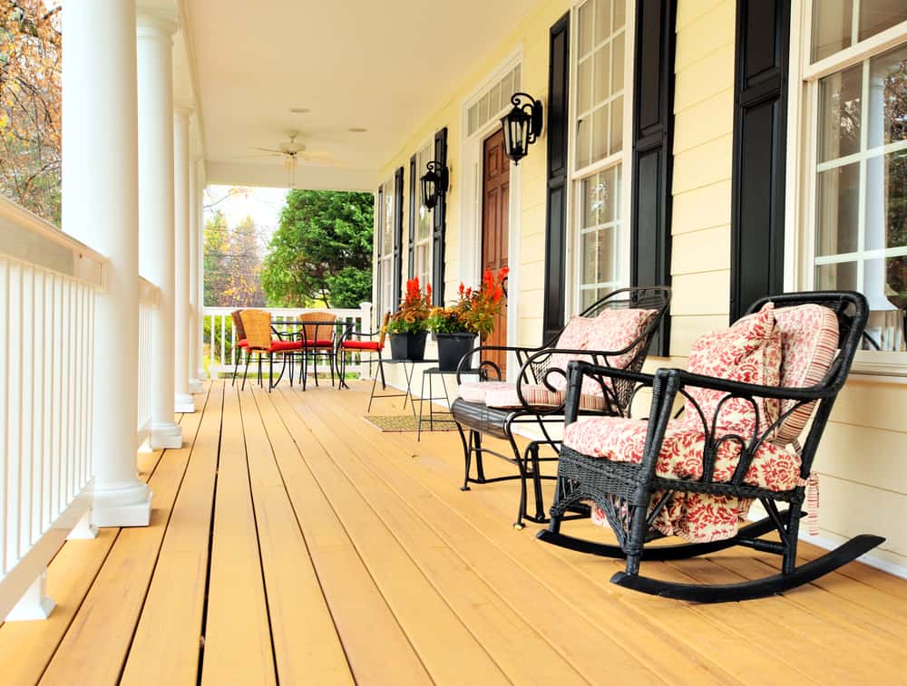 pink black rocking chairs porch