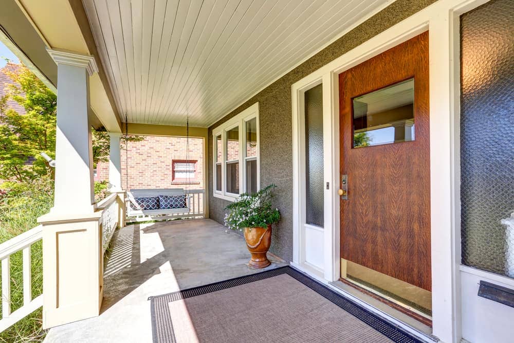 porch plant rug wood railing