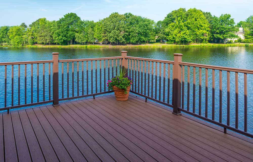 corner potted plant over lake