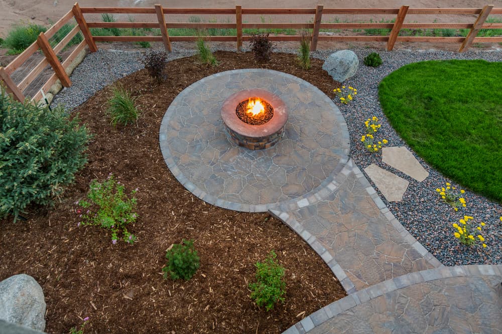 extended patio with fire pit