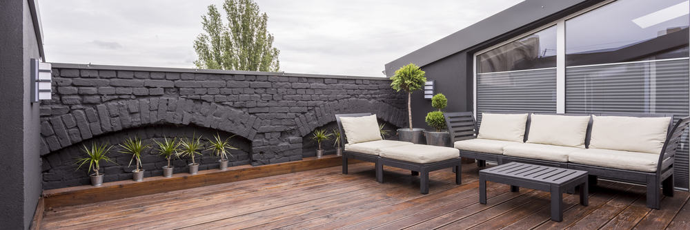 grey brick wall white furniture