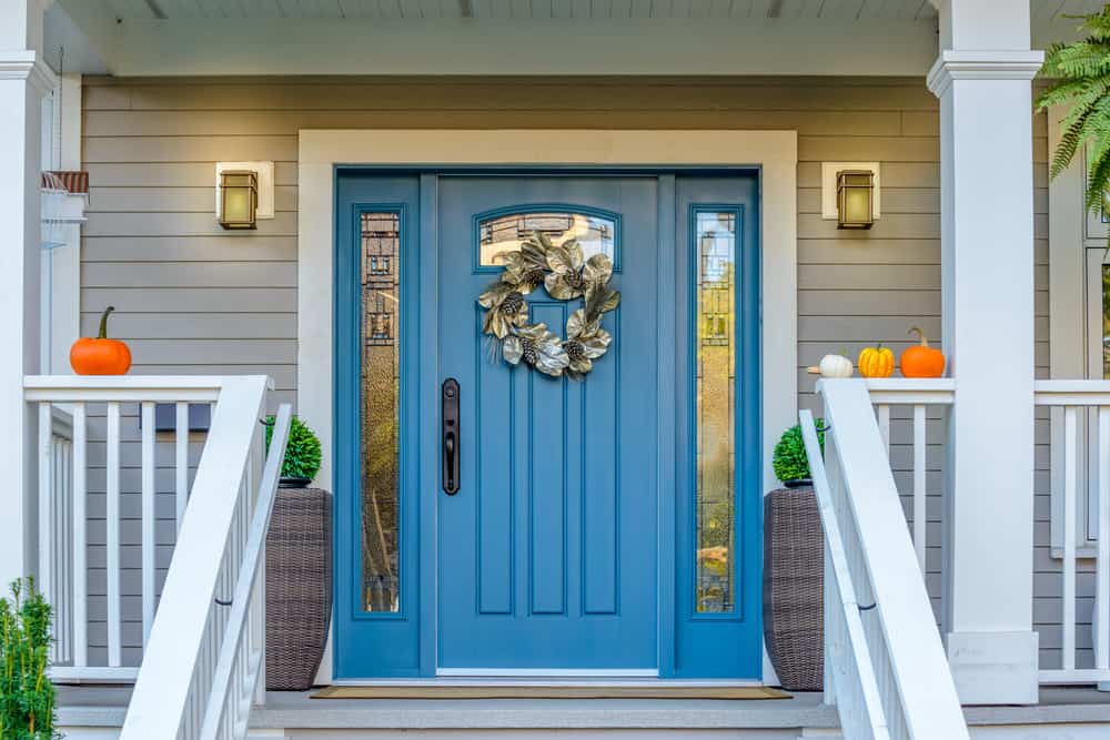 blue door with wreath