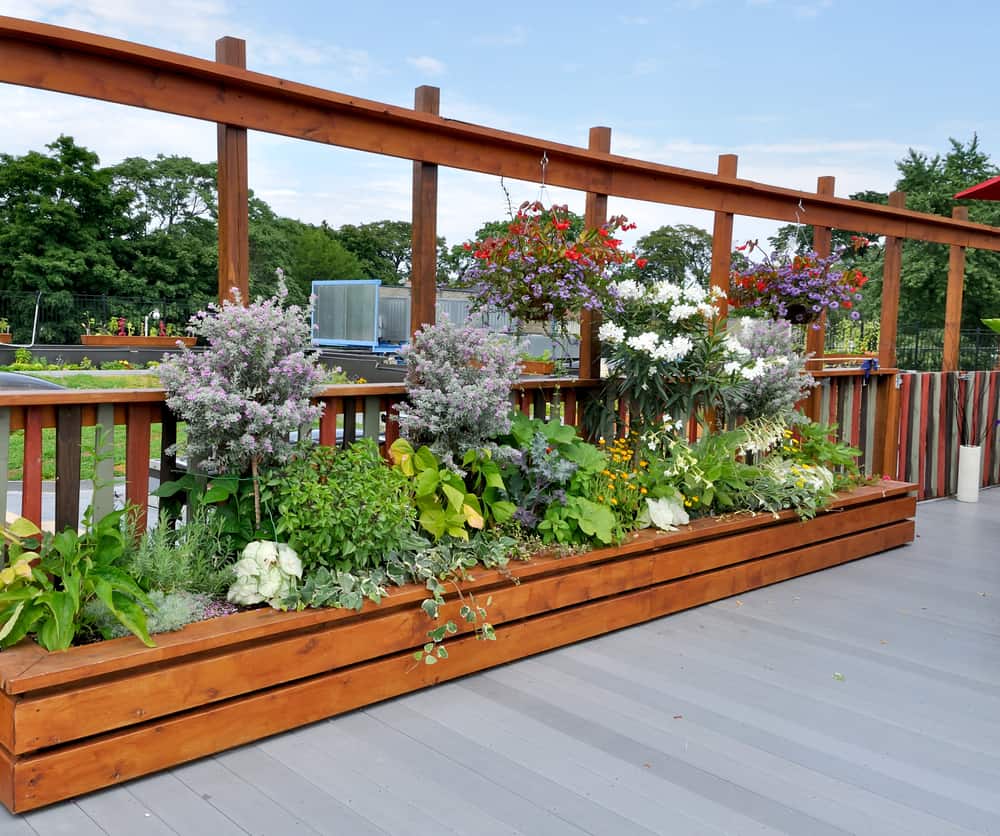 half wall raised deck garden
