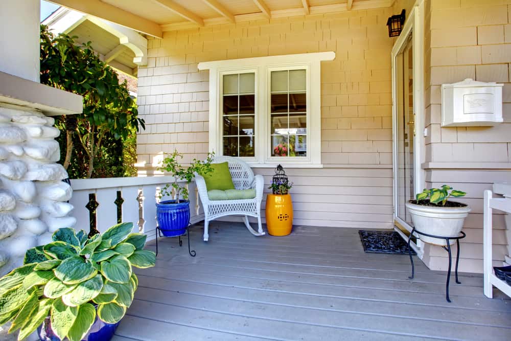 white chair colorful pots