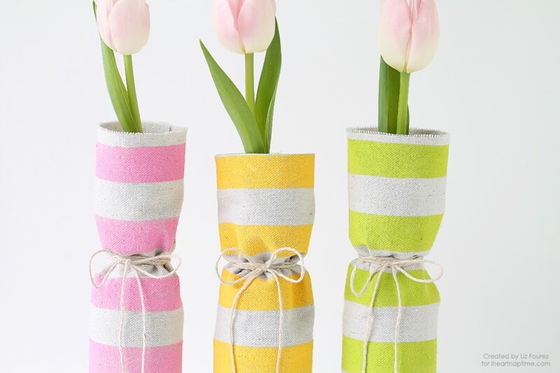 Fabric Covered Spring Vases When spring is in the air then it is time to start decorating too! These easy fabric covered spring vases are just what you need to add a few pops of color to any room. thesawguy.com