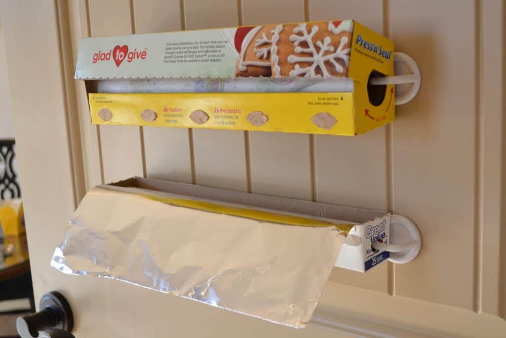 Plastic Wrap Storage Plastic wrap and aluminum foil are a couple of items that never really seem to have a place in the house that makes sense. Not anymore, with this plastic wrap storage system. All you need is some adhesive hooks and you are well on your way! thesawguy.com