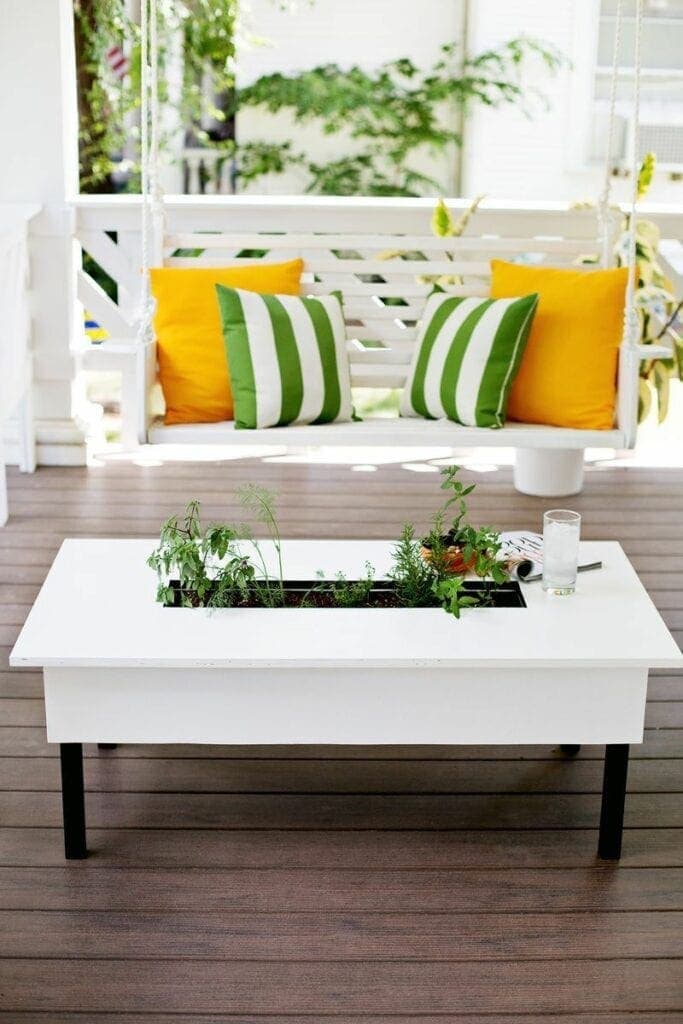 DIY Coffee Table With Herb Garden Your friends and family will be envious when you show them this unique coffee table with an herb garden. The best part is you will have all of your favorite herbs right at your fingertips too. This is seriously one of the coolest pieces to add to your patio. thesawguy.com