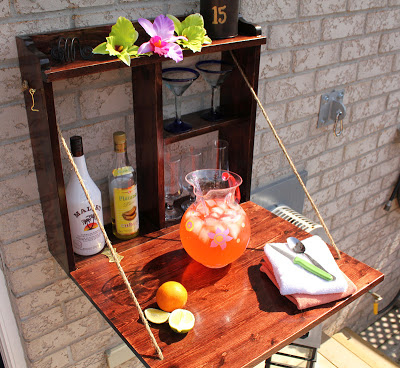 DIY Backyard Bar You don't have to have loads of money to have an incredible backyard bar! The best part is that it is hinged so when you are using it you can fold it up and have it out the way. Break out the margaritas for this one! thesawguy.com
