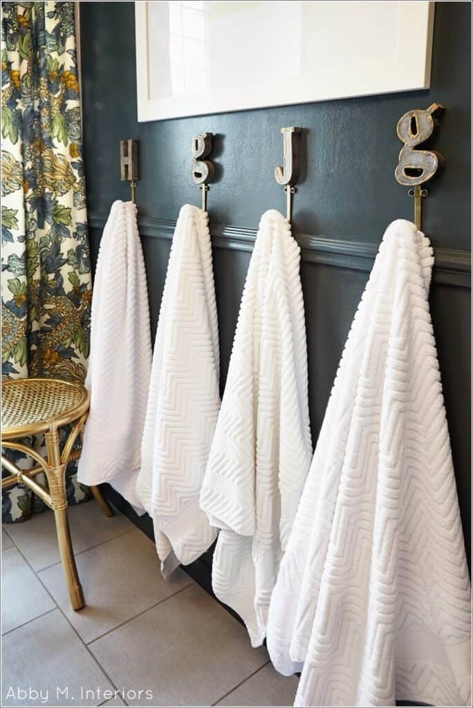 Initial Towel Hooks Add some pizzazz to your bathroom decorating while increasing your storage with these towel hooks. Put up an initial for each person in the home and everyone can easily keep track of which towel belongs to which person. How great is that? thesawguy.com