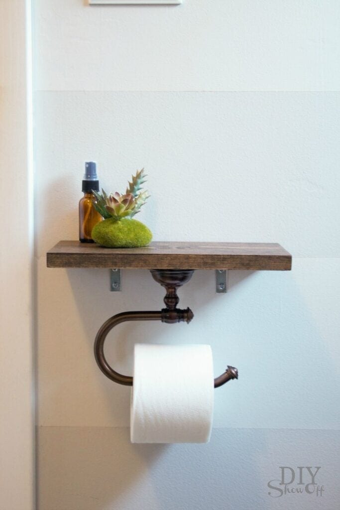 Toilet Paper Holder Talk about a unique and useful idea! This toilet paper holder is also a shelf that you can store air freshener, washcloths, cotton balls, or anything else you desire. It is a rustic style that goes with any other farmhouse decorations. Take a look at this one! thesawguy.com