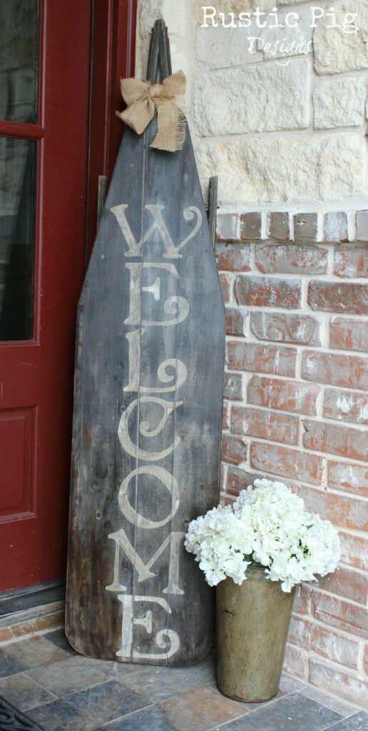 Rustic Welcome Sign How often are you at a thrift store, vintage market sale or digging around in storage and come across an old ironing board? Now we finally have a unique way upcycle the ironing board into a beautiful rustic welcome sign. Easy, looks terrific, and cheap to make! Triple threat! thesawguy.com