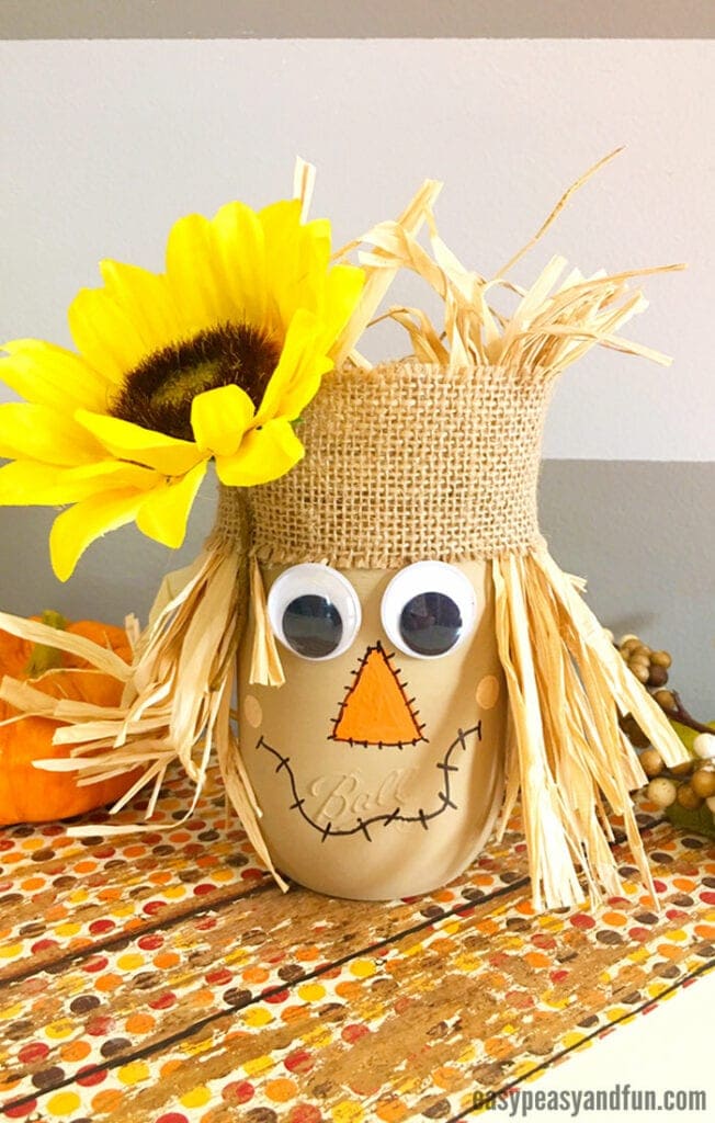 Scarecrow Mason Jar: These 25 Thanksgiving Crafts for Kids will get everyone into the thanksgiving spirit. 