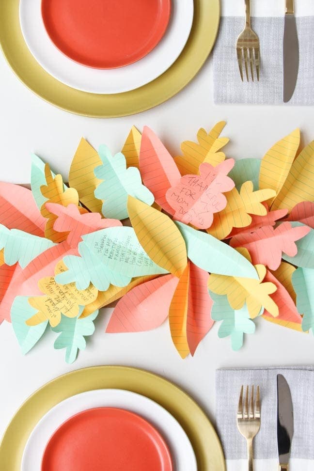 Paper Leaf Table Runner: These 25 Thanksgiving Crafts for Kids will get everyone into the thanksgiving spirit.